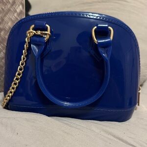 Elegant Blue Handbag with Gold Accents